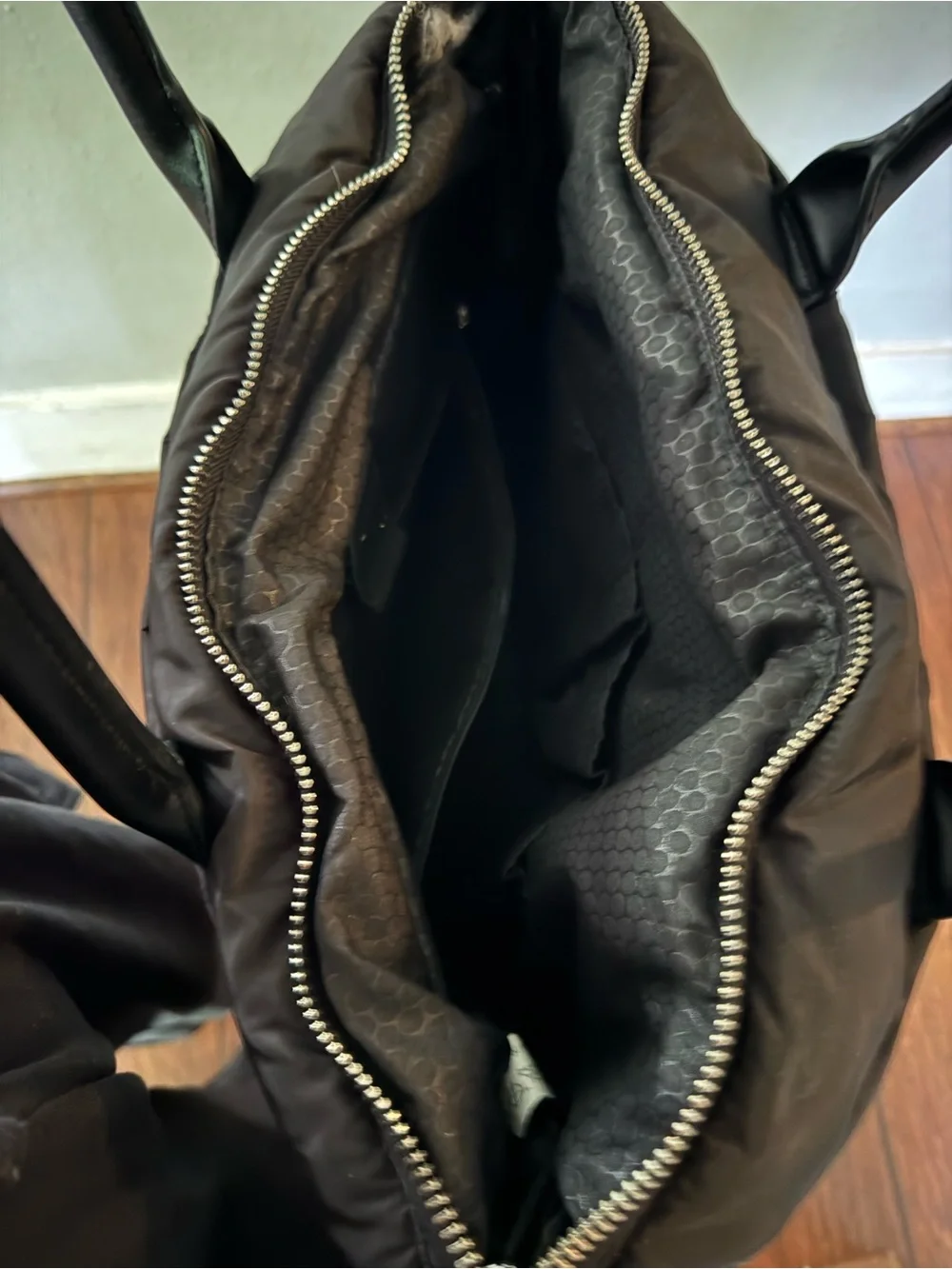 Black Quilted Tote Bag with Zipper Accents
